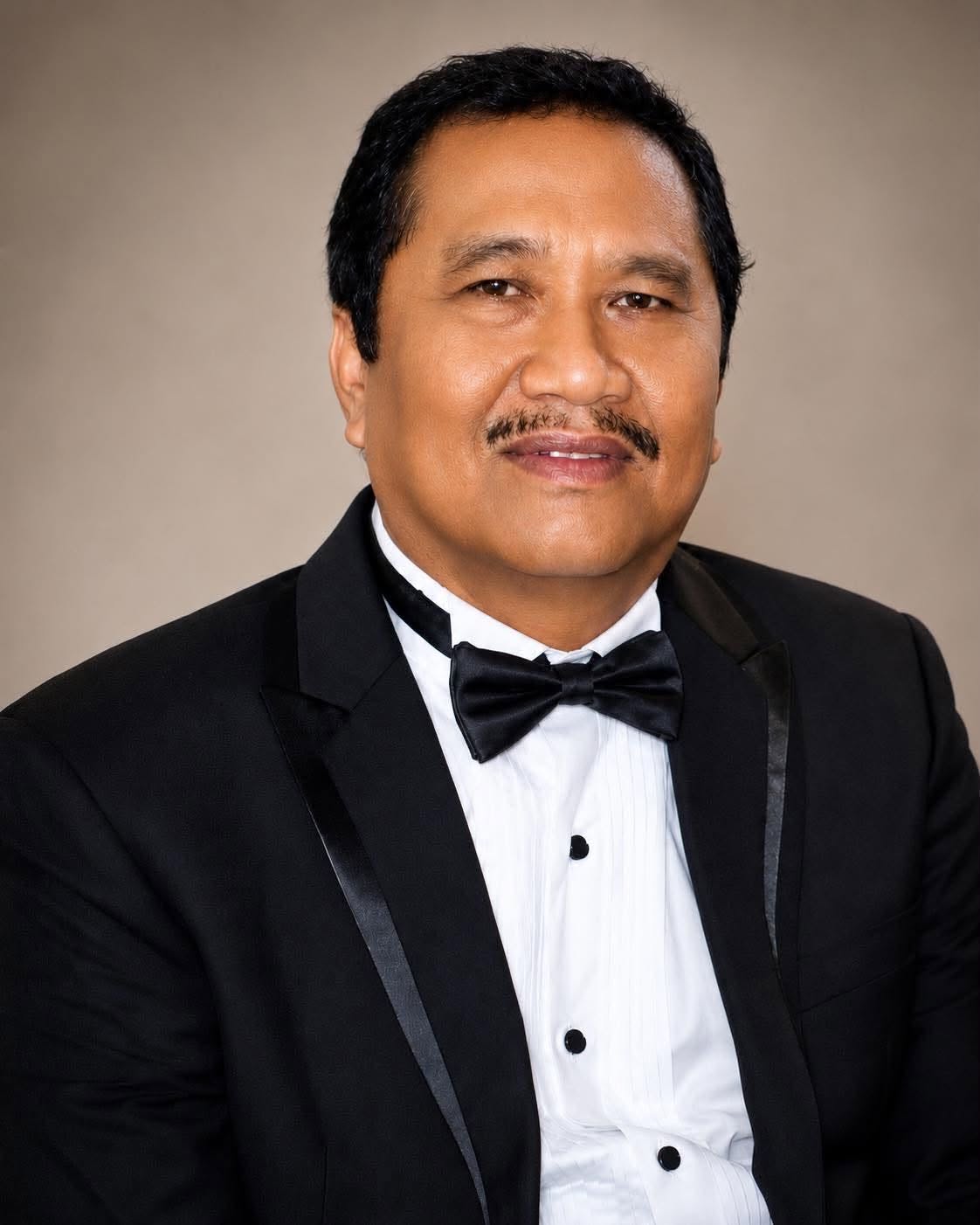 Portrait of Dr. Diosdado Daddy Dads Sumaylo